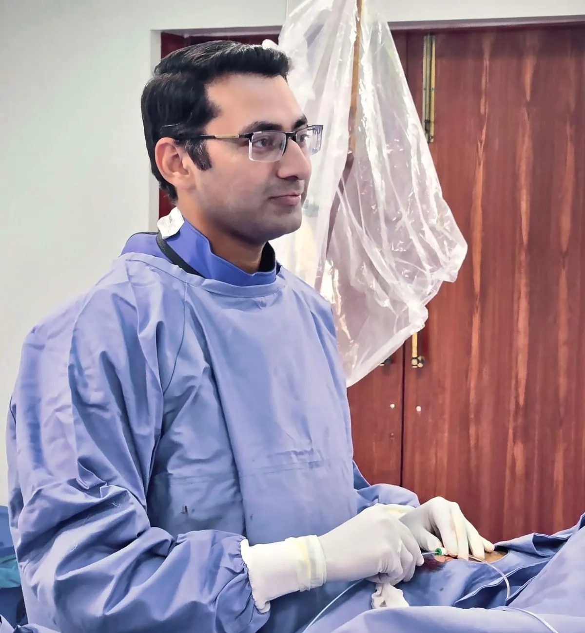 Dr. Azhar ul Hassan Qureshi, Consultant Interventional Cardiologist, in the cardiac catheterisation laboratory